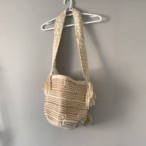 Stunning handmade jeweled cream bag with Pom Pom details